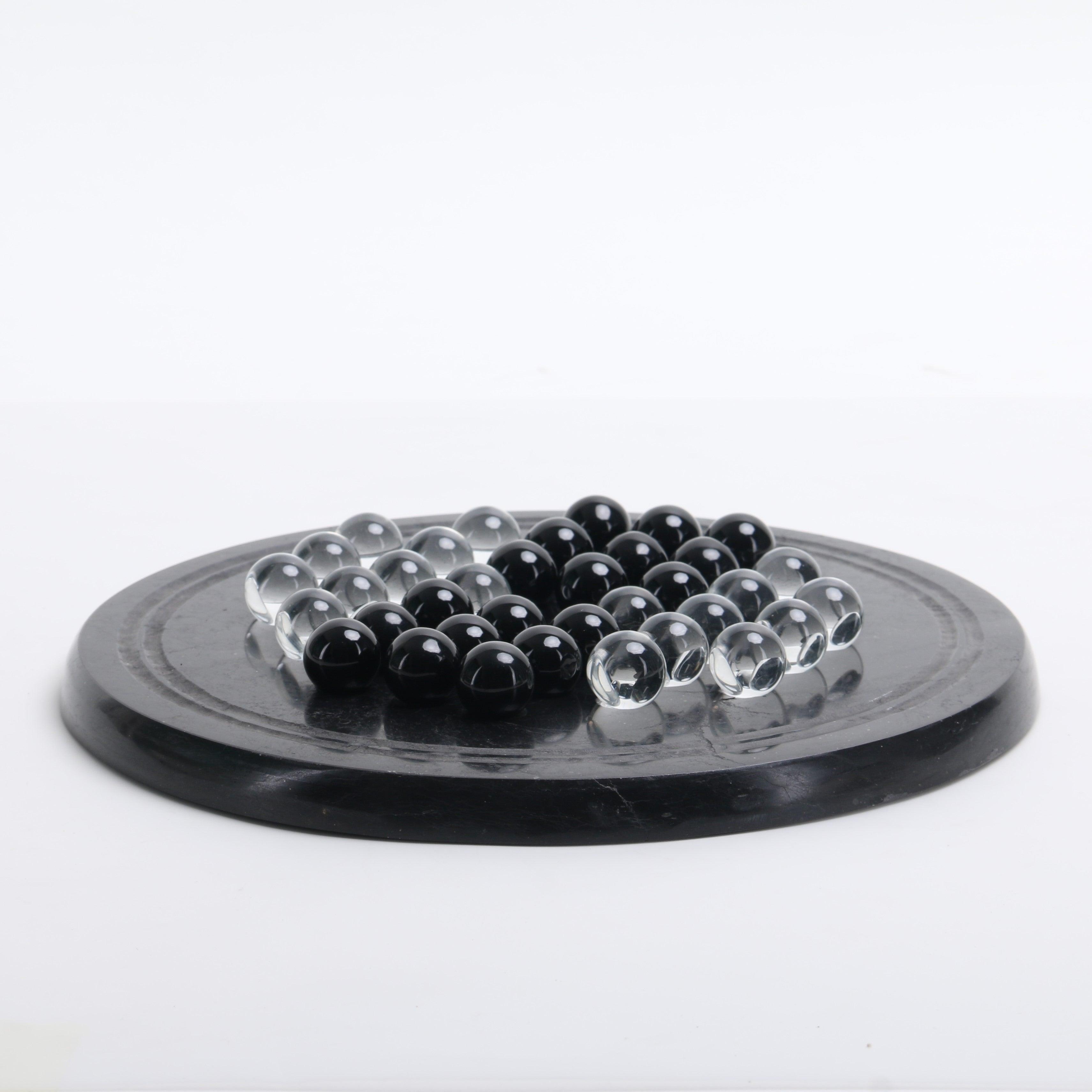 Handcrafted marble checkers decor object on coffee table — Daamaira