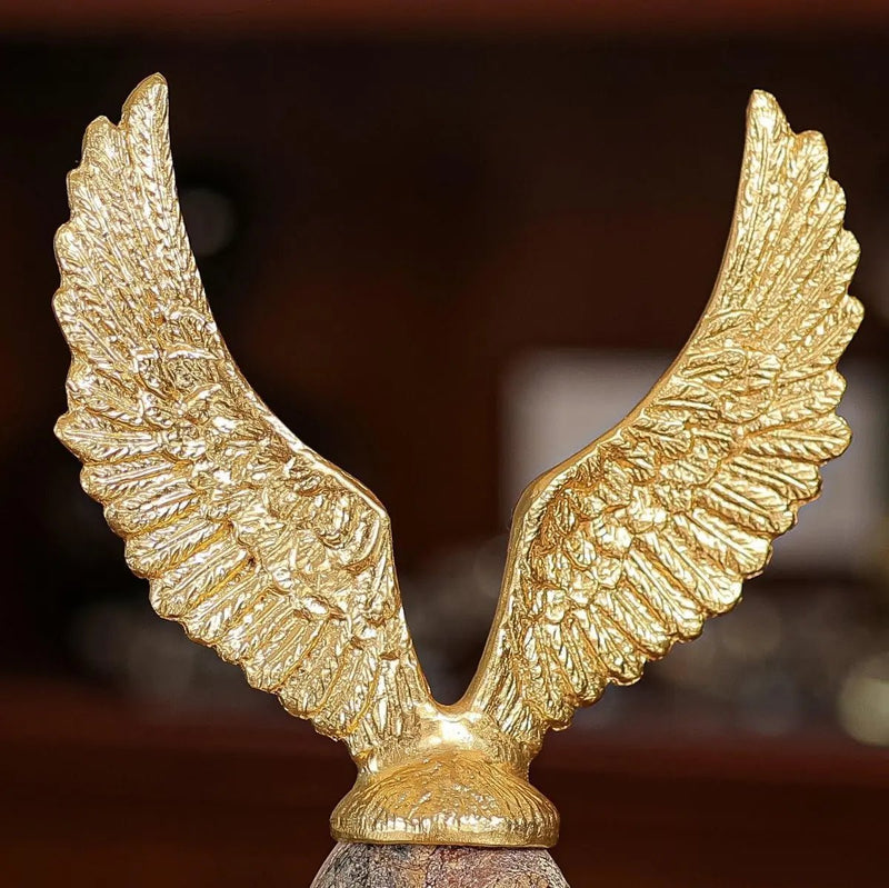 Golden Flying Egg Sculpture — image 3